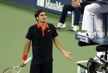 NEW YORK - SEPTEMBER 14:  Roger Federer of Switzerland (L) disputes a call in the fourth set tiebreak to chair judge Jake Garner during the Men�s Singles final on day fifteen of the 2009 U.S. Open at the USTA Billie Jean King National Tennis Center on September 14, 2009 in the Flushing neighborhood of the Queens borough of New York City.  (Photo by Nick Laham/Getty Images)