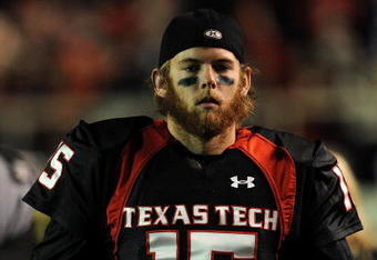 LUBBOCK, TX - NOVEMBER 08:  Quarterback Taylor Potts #15 of the Texas Tech Red Raiders during play against the Oklahoma State Cowboys at Jones AT&T Stadium on November 8, 2008 in Lubbock, Texas.  (Photo by Ronald Martinez/Getty Images)