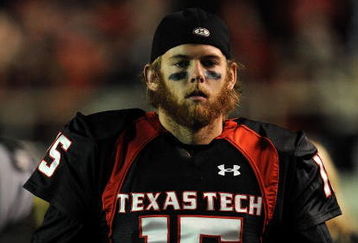 LUBBOCK, TX - NOVEMBER 08:  Quarterback Taylor Potts #15 of the Texas Tech Red Raiders during play against the Oklahoma State Cowboys at Jones AT&T Stadium on November 8, 2008 in Lubbock, Texas.  (Photo by Ronald Martinez/Getty Images)