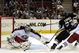 PITTSBURGH, PA - SEPTEMBER 15: Chris Conner #23 of the Pittsburgh Penguins takes a shot on Mathieu Garon #32 of the Columbus Blue Jackets in the second period at Mellon Arena on September 15, 2009 in Pittsburgh, Pennsylvania. (Photo by Justin K. Aller/Getty Images)