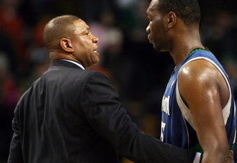 BOSTON - FEBRUARY 01:  Head coach Doc Rivers of the Boston Celtics talks to Al Jefferson #25 of Minnesota Timberwolves after the game on February 1, 2009 at TD Banknorth Garden in Boston, Massachusetts. The Celtics defeated the Minnesota Timberwolves 109-101. NOTE TO USER: User expressly acknowledges and agrees that, by downloading and or using this Photograph, user is consenting to the terms and conditions of the Getty Images License Agreement.  (Photo by Elsa/Getty Images)