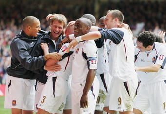 CARDIFF, UNITED KINGDOM - MAY 13:  (L-R) Bobby Zamora and Teddy Sheringham and members of the West Ham United team celebrate with Paul Konchesky after he scores his sides third goal during the FA Cup Final match between Liverpool and West Ham United at the Millennium Stadium on May 13, 2006 in Cardiff, Wales.  (Photo by Phil Cole/Getty Images)