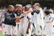 CARDIFF, UNITED KINGDOM - MAY 13:  (L-R) Bobby Zamora and Teddy Sheringham and members of the West Ham United team celebrate with Paul Konchesky after he scores his sides third goal during the FA Cup Final match between Liverpool and West Ham United at the Millennium Stadium on May 13, 2006 in Cardiff, Wales.  (Photo by Phil Cole/Getty Images)