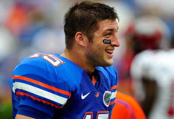 GAINESVILLE, FL - SEPTEMBER 12:  Tim Tebow #15 of the Florida Gators watches the action prior to the game against the Troy Trojans at Ben Hill Griffin Stadium on September 12, 2009 in Gainesville, Florida.  (Photo by Sam Greenwood/Getty Images)