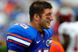 GAINESVILLE, FL - SEPTEMBER 12:  Tim Tebow #15 of the Florida Gators watches the action prior to the game against the Troy Trojans at Ben Hill Griffin Stadium on September 12, 2009 in Gainesville, Florida.  (Photo by Sam Greenwood/Getty Images)
