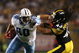 PITTSBURGH - SEPTEMBER 10: Safety Troy Polamalu #43 of the Pittsburgh Steelers gets a penalty for holding the face mask of tight end Bo Scaife #80 of the Tennessee Titans during the second quarter of the NFL season opener at Heinz Field on September 10, 2009 in Pittsburgh, Pennsylvania. (Photo by Elsa/Getty Images)