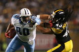PITTSBURGH - SEPTEMBER 10:  Safety Troy Polamalu #43 of the Pittsburgh Steelers gets a penalty for holding the face mask of tight end Bo Scaife #80 of the Tennessee Titans during the second quarter of the NFL season opener at Heinz Field on September 10, 2009 in Pittsburgh, Pennsylvania. (Photo by Elsa/Getty Images)