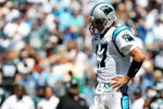 CHARLOTTE, NC - SEPTEMBER 13:  Quarterback Jake Delhomme #17 of the Carolina Panthers stands on the field in the second half of the NFL season opener against the Philadelphia Eagles at Bank of America Stadium on September 13, 2009 in Charlotte, North Carolina.  (Photo by Streeter Lecka/Getty Images)