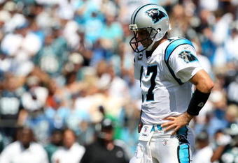 CHARLOTTE, NC - SEPTEMBER 13:  Quarterback Jake Delhomme #17 of the Carolina Panthers stands on the field in the second half of the NFL season opener against the Philadelphia Eagles at Bank of America Stadium on September 13, 2009 in Charlotte, North Carolina.  (Photo by Streeter Lecka/Getty Images)