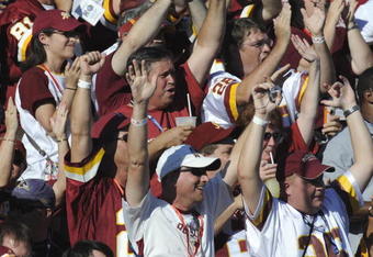 CANTON, OH - AUGUST 2: Fans of the Washington Redskins cheer during the Class of 2008 Pro Football Hall of Fame Enshrinement Ceremony at Fawcett Stadium on August 2, 2008 in Canton, Ohio.   (Photo by Al Messerschmidt/Getty Images)