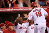 ANAHEIM, CA - APRIL 22:  Kendry Morales #19 of the Los Angeles Angels of Anaheim is congratulated by teammate Torii Hunter #48 after hitting a three-run home run against the Detroit Tigers during the first inning of the baseball game at Angel Stadium on April 22, 2009 in Anaheim, California.  (Photo by Kevork Djansezian/Getty Images)