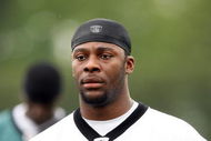 PHILADELPHIA - MAY 1: Linebacker Charleston Hughes #52 of the Philadelphia Eagles looks on during minicamp practice at the NovaCare Complex on May 1, 2009 in Philadelphia, Pennsylvania. (Photo by Hunter Martin/Getty Images)