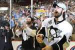DETROIT - JUNE 12: Kris Letang #58 of the Pittsburgh Penguins celebrates following the Penguins victory over the Detroit Red Wings in Game Seven of the 2009 NHL Stanley Cup Finals at Joe Louis Arena on June 12, 2009 in Detroit, Michigan. (Photo by Bruce Bennett/Getty Images)
