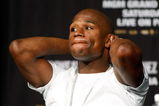 LAS VEGAS - SEPTEMBER 16:  Boxer Floyd Mayweather Jr. stretches during the final news conference for his bout against Juan Manuel Marquez at the MGM Grand Hotel/Casino September 16, 2009 in Las Vegas, Nevada. The two will fight at the MGM Grand Garden Arena on September 19 in Las Vegas.  (Photo by Ethan Miller/Getty Images)