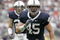 STATE COLLEGE, PA - SEPTEMBER 12: Linebacker Sean Lee of the Penn State Nittany Lions  lines up for a play against  the Syracuse Orangemen during the second half at Beaver Stadium  September 12, 2009 in State College, Pennsylvania. Penn State won 28-7. (Photo by Chris Gardner/Getty Images)