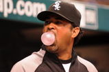 ST. PETERSBURG, FL - APRIL 16: Manager Ozzie Guillen #13 of the  Chicago White Sox blows a bubble against the Tampa Bay Rays on April 16, 2009 at Tropicana Field in St. Petersburg, Florida.  (Photo by Al Messerschmidt/Getty Images)