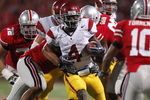 COLUMBUS, OH - SEPTEMBER 13:  Joe McKnight #4 of the Southern California Trojans looks for running room while playing the Ohio State Buckeyes on September 13, 2009 at Ohio Stadium in Columbus, Ohio. USC won the game 18-15. (Photo by Gregory Shamus/Getty Images)