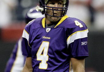 HOUSTON - AUGUST 31:  Quarterback Brett Favre #4 of the Minnesota Vikings looks on during pre-game warm-up prior to the preseasn game against the Houston Texans at Reliant Stadium on August 31, 2009 in Houston, Texas.  (Photo by Bob Levey/Getty Images)