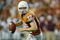 AUSTIN, TX - SEPTEMBER 5:  Quarterback Colt McCoy #12 of the Texas Longhorns runs out of the pocket against the Louisiana Monroe Warhawks on September 5, 2009 at Darrell K Royal-Texas Memorial Stadium in Austin, Texas. The Longhorns defeated the Warhawks 59-20. (Photo by Brian Bahr/Getty Images)