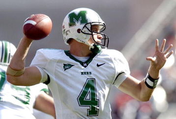 COLUMBUS, OH - SEPTEMBER 11:  Quarterback Stan Hill #4 of the Marshall Thundering Herd throws a pass against the Ohio State Buckeyes on September 11, 2004 at Ohio Stadium in Columbus, Ohio.  Ohio State defeated Marshall 24-21.   (Photo by David Maxwell/Getty Images)