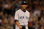 SEATTLE - SEPTEMBER 18:  Closing pitcher Mariano Rivera #42 of the New York Yankees leaves the field after giving up a game winning two-run homer in the bottom of the ninth inning to Ichiro Suzuki #51 of the Seattle Mariners on September 18, 2009 at Safeco Field in Seattle, Washington. (Photo by Otto Greule Jr/Getty Images)