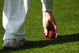 LONDON, ENGLAND - APRIL 22:  A fielder picks up the ball during day one of the LV County Championship Division 2 match between Middlesex and Glamorgan at Lords on April 22, 2009 in London, England.  (Photo by Ryan Pierse/Getty Images)