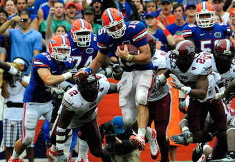 GAINESVILLE, FL - SEPTEMBER 12:  Tim Tebow #15 of the Florida Gators runs for yardage during the game against the Troy Trojans at Ben Hill Griffin Stadium on September 12, 2009 in Gainesville, Florida.  (Photo by Sam Greenwood/Getty Images)
