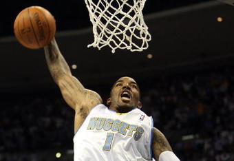 DENVER - MAY 23:  J.R. Smith #1 of the Denver Nuggets dunks the ball after the whistle against the Los Angeles Lakers in Game Three of the Western Conference Finals during the 2009 NBA Playoffs at Pepsi Center on May 23, 2009 in Denver, Colorado. NOTE TO USER: User expressly acknowledges and agrees that, by downloading and or using this photograph, User is consenting to the terms and conditions of the Getty Images License Agreement.  (Photo by Jed Jacobsohn/Getty Images)
