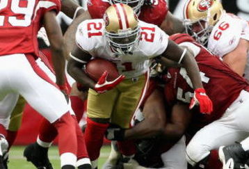 GLENDALE, AZ - SEPTEMBER 13:  Runningback Frank Gore #21 of the San Francisco 49ers rushes the football during the NFL game against the Arizona Cardinals at the Universtity of Phoenix Stadium on September 13, 2009 in Glendale, Arizona. The 49ers defeated the Cardinals 20-16.  (Photo by Christian Petersen/Getty Images)