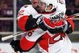 NEW YORK - MARCH 22: Ryan Shannon #26 of the Ottawa Senators is congratulated by Mike Fisher #12 after scoring the Senators second goal against the New York Rangers on March 22, 2009 at Madison Square Garden in New York City, New York.  (Photo by Nick Laham/Getty Images)