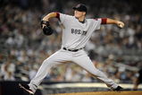 NEW YORK - AUGUST 09:  Jon Lester #31 of the Boston Red Sox delivers to the plate in the first inning against the New York Yankees on August 9, 2009 at Yankee Stadium in the Bronx Borough of New York City.  (Photo by Jeff Zelevansky/Getty Images)