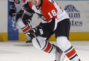 LONDON, ON - SEPTEMBER 17:  Mike Richards #18 of the Philadelphia Flyers skates in a pre-season game against the Toronto Maple Leafs on September 17, 2009 at the John Labatt Centre in London, Ontario. The Leafs defeated the Flyers 4-0. (Photo by Claus Andersen/Getty Images)