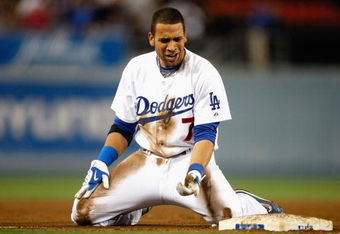 LOS ANGELES, CA - SEPTEMBER 14:  James Loney #7 of the Los Angeles Dodgers reacts after being thrown out at third base in the eighth inning against the Pittsburgh Pirates at Dodger Stadium on September 14, 2009 in Los Angeles, California. The Dodgers defeated the Pirates 6-2.  (Photo by Jeff Gross/Getty Images)