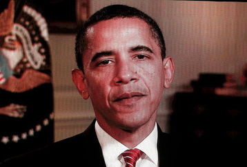 LOS ANGELES, CA - JULY 15:  President Barack Obama delivers a taped speech regarding the Arthur Ashe Courage Award during the 2009 ESPY Awards held at Nokia Theatre LA Live on July 15, 2009 in Los Angeles, California. The 17th annual ESPYs will air on Sunday, July 19 at 9PM ET on ESPN.  (Photo by Kevin Winter/Getty Images)