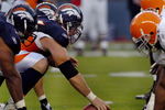 DENVER - AUGUST 25: Center Tom Nalen #66  of the Denver Broncos gets set to snap the ball during the pre-season football game against the Cleveland Browns on August 25, 2006 at Invesco Field at Mile High in Denver, Colorado.   (Photo by Steve Dykes/Getty Images)