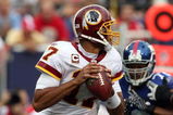 EAST RUTHERFORD, NJ - SEPTEMBER 13:  Jason Campbell #17 of the Washington Redskins looks to throw a pass against the New York Giants on September 13, 2009 at Giants Stadium in East Rutherford, New Jersey.  (Photo by Jim McIsaac/Getty Images)