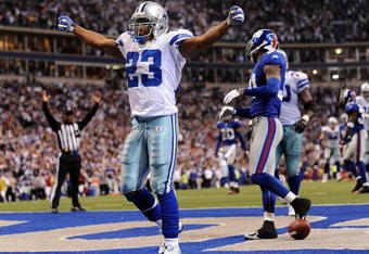 IRVING, TX - DECEMBER 14:  Running back Tashard Choice #23 of the Dallas Cowboys celebrates his touchdown against the New York Giants in the fourth quarter at Texas Stadium on December 14, 2008 in Irving, Texas.  (Photo by Ronald Martinez/Getty Images)