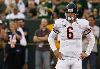 GREEN BAY, WI - SEPTEMBER 13: Jay Cutler #6 of the Chicago Bears participates in warm-ups before a game against the Green Bay Packers on September 13, 2009 at Lambeau Field in Green Bay, Wisconsin. The Packers defeated the Bears 21-15. (Photo by Jonathan Daniel/Getty Images)