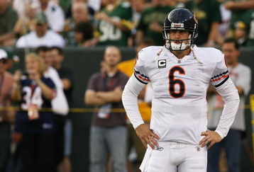 GREEN BAY, WI - SEPTEMBER 13: Jay Cutler #6 of the Chicago Bears participates in warm-ups before a game against the Green Bay Packers on September 13, 2009 at Lambeau Field in Green Bay, Wisconsin. The Packers defeated the Bears 21-15. (Photo by Jonathan Daniel/Getty Images)