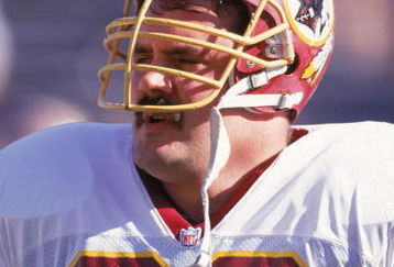 PHOENIX - DECEMBER 8:  Offensive linebacker Russ Grimm #68 of the Washington Redskins stands on the sideline during a game against the Phoenix Cardinals on December 8, 1991 at Sun Devil Stadium in Phoenix, Arizona. (Photo by Mike Powell/Getty Images)