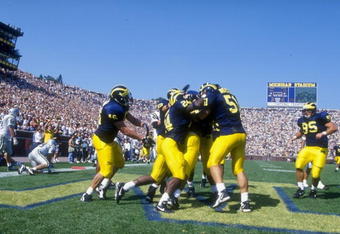 19 Sep 1998:  General view of the Michigan Wolverines celebrating during the game against the Eastern Michigan Eagles at the Michigan Stadium in Ann Arbor, Michigan. The Wolverines defeated the Eagles 59-20. Mandatory Credit: Tim Brokema  /Allsport