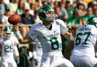 SOUTH BEND, IN - SETPEMBER 19: Kirk Cousins #8 of the Michigan State Spartans throws a pass against the Notre Dame Fighting Irish on September 19, 2009 at Notre Dame Stadium in South Bend, Indiana. (Photo by Jonathan Daniel/Getty Images)