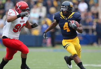 BERKELEY, CA - SEPTEMBER 12: Jahvid Best #4 of the California Golden Bears runs against Josh Jacobson #90 of the Eastern Washington Eagles at Memorial Stadium on September 12, 2009 in Berkeley, California. (Photo by Jed Jacobohn/Getty Images)