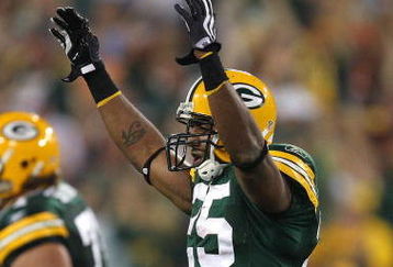 GREEN BAY, WI - SEPTEMBER 13: Ryan Grant #25 of the Green Bay Packers signals the game-winning touchdown against the Chicago Bears on September 13, 2009 at Lambeau Field in Green Bay, Wisconsin. The Packers defeated the Bears 21-15. (Photo by Jonathan Daniel/Getty Images)