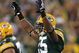 GREEN BAY, WI - SEPTEMBER 13: Ryan Grant #25 of the Green Bay Packers signals the game-winning touchdown against the Chicago Bears on September 13, 2009 at Lambeau Field in Green Bay, Wisconsin. The Packers defeated the Bears 21-15. (Photo by Jonathan Daniel/Getty Images)
