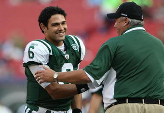 EAST RUTHERFORD, NJ - AUGUST 14:  Mark Sanchez #6 of the New York Jets shakes hands with head coach Rex Ryan prior to the preseason game against the St. Louis Rams at Giants Stadium on August 14, 2009  in East Rutherford, New Jersey.  (Photo by Nick Laham/Getty Images)