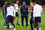 COBHAM, SURREY - SEPTEMBER 14:  Manager Carlo Ancelotti (centre) in relaxed mood during a Chelsea training session at the Chelsea training ground on September 14, 2009 in Cobham, Surrey.  (Photo by Mike Hewitt/Getty Images)