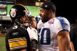 PITTSBURGH - SEPTEMBER 11: Jeff Reed #3 of the Pittsburgh Steelers is congratulated by David Thornton #50 of the Tennessee Titans after Reed scored the game winning field goal in overtime on September 11, 2009 at Heinz Field in Pittsburgh, Pennsylvania. The Steelers defeated the Titans 13-10 in overtime.  (Photo by Elsa/Getty Images)