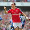 LONDON, ENGLAND - SEPTEMBER 19:  Thomas Vermaelen of Arsenal celebrates his goal during the Barclays Premier League match between Arsenal and Wigan Athletic at the Emirates Stadium on September 19, 2009 in London, England.  (Photo by Clive Mason/Getty Images)