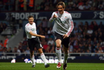 LONDON, ENGLAND - SEPTEMBER 19:  Fernando Torres of Liverpool celebrates scoring the third goal during the Barclays Premier League match between West Ham United and Liverpool at Upton Park on September 19, 2009 in London, England.  (Photo by Jamie McDonald/Getty Images)